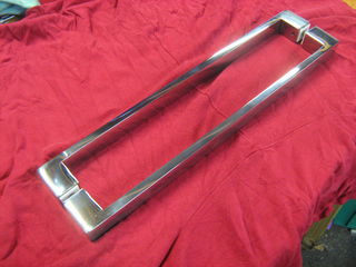 Custom polished stainless door handle